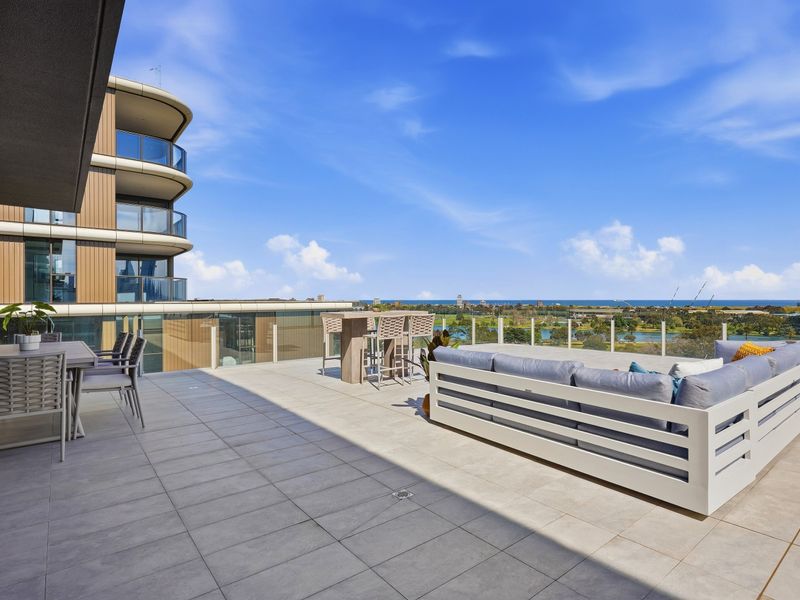 Open-air entertaining space with comfortable seating and stunning vistas.