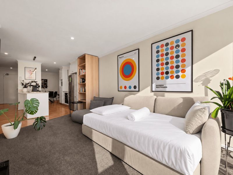 The sofa converts into a King single bed, offering flexible sleeping space for an additional guest.