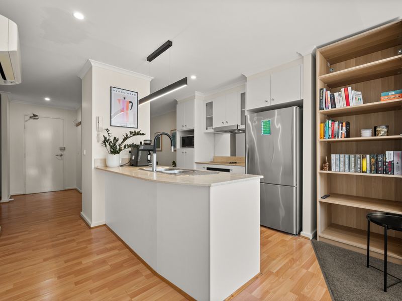 Open-plan dining and kitchen area designed for comfortable everyday living.