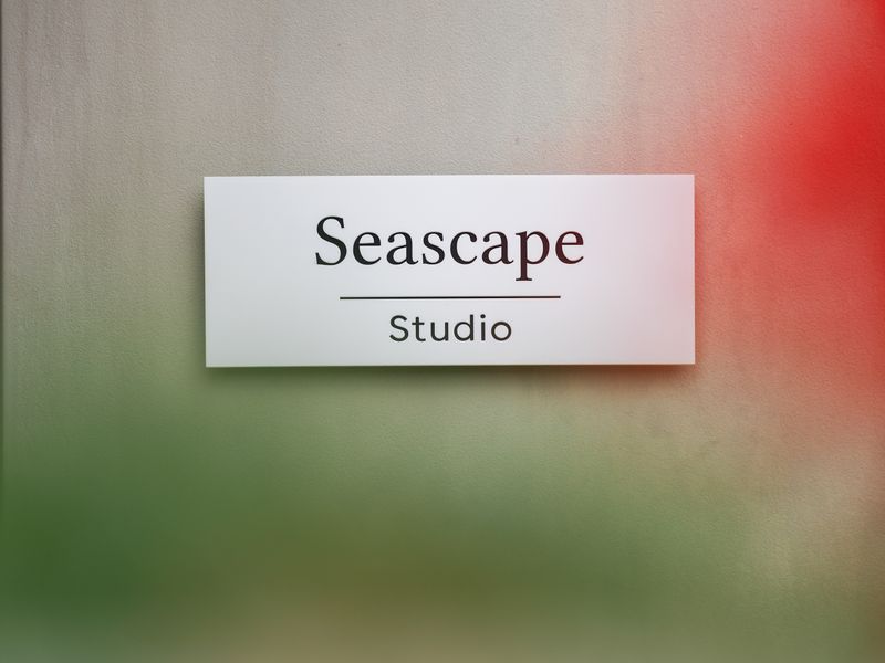 Entrance sign displaying "Seascapes Studio" in a clean modern font.