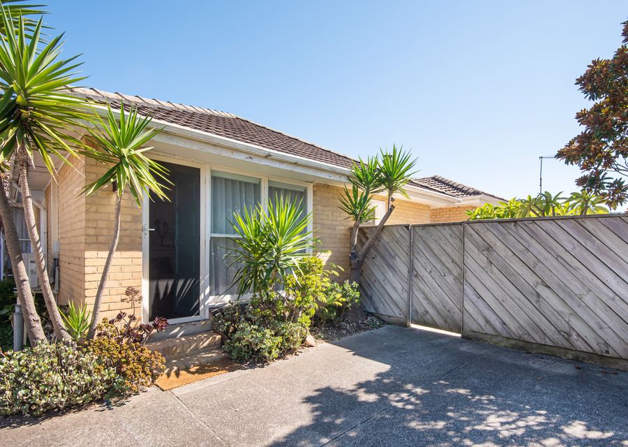 Front fascade with off street parking for 1 car