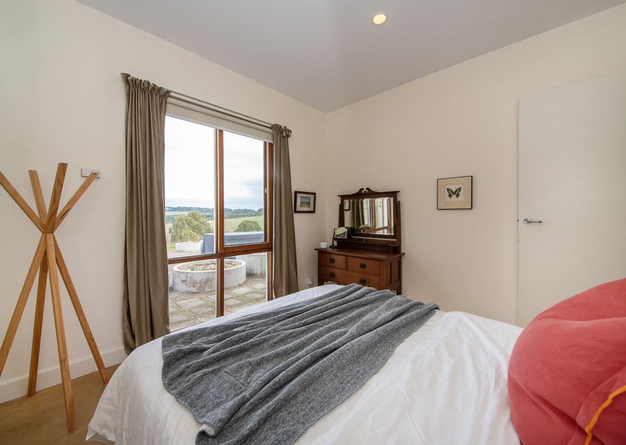 Bedroom three with queen bed