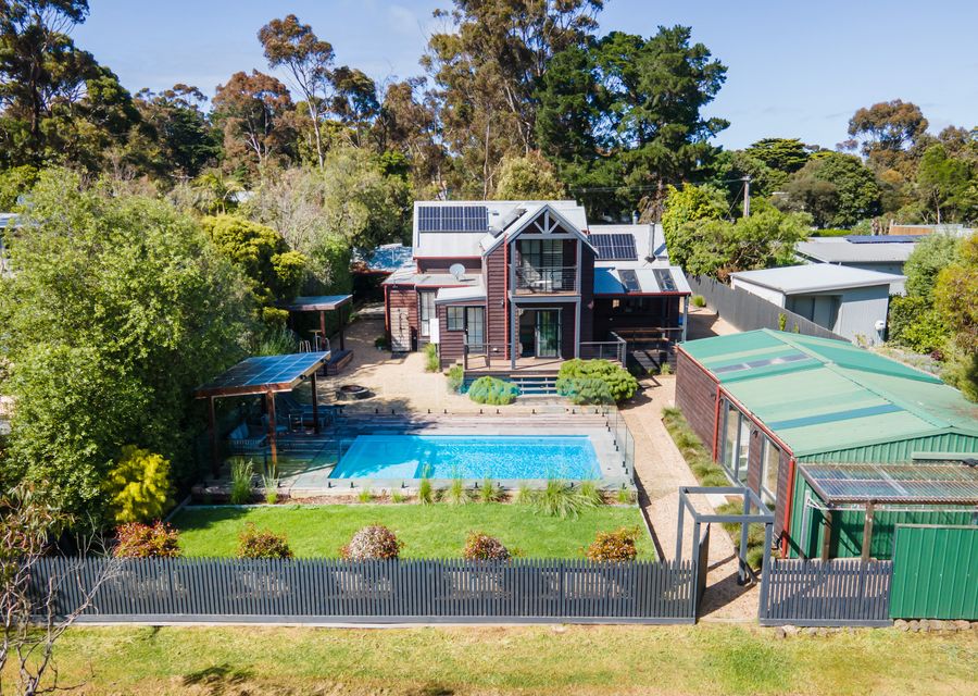 Back Garden with view of Pool and Games Room