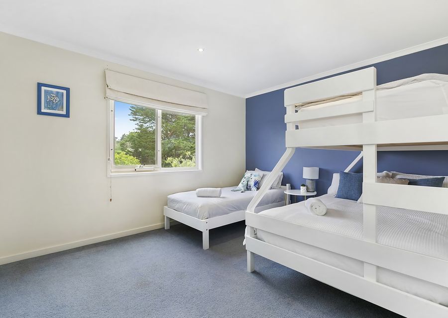 Bunkroom - upstairs.  Double bunk, single above and single bed 