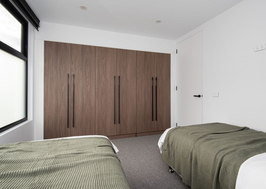 Bedroom with two single beds, these can be pushed together if you have three couples staying