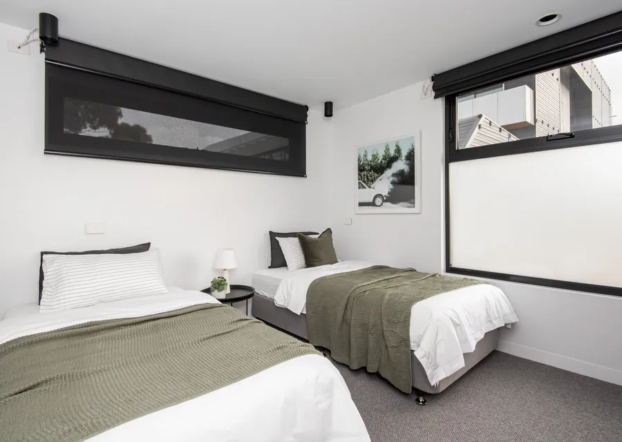 Bedroom with two single beds, these can be pushed together if you have three couples staying