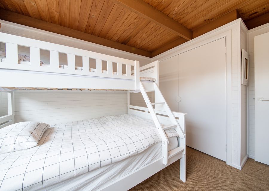 Bedroom two with double bunk, single above 