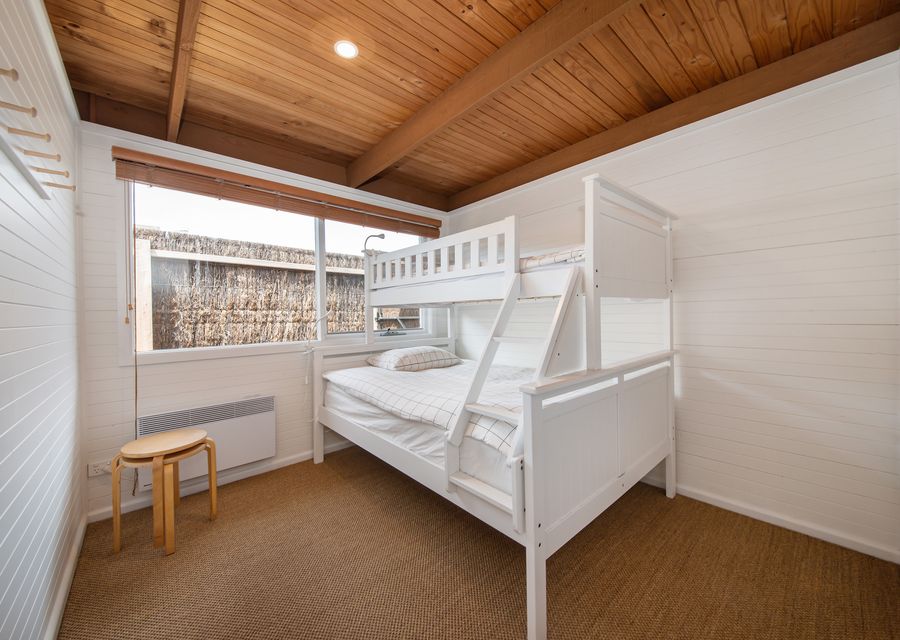 Bedroom two with double bunk, single above 