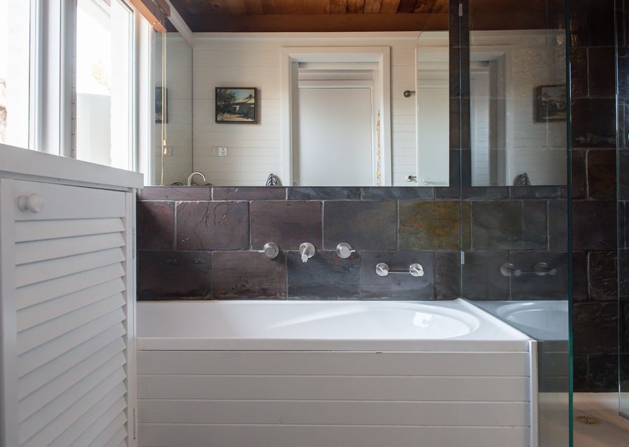 Bathroom with bath and shower 