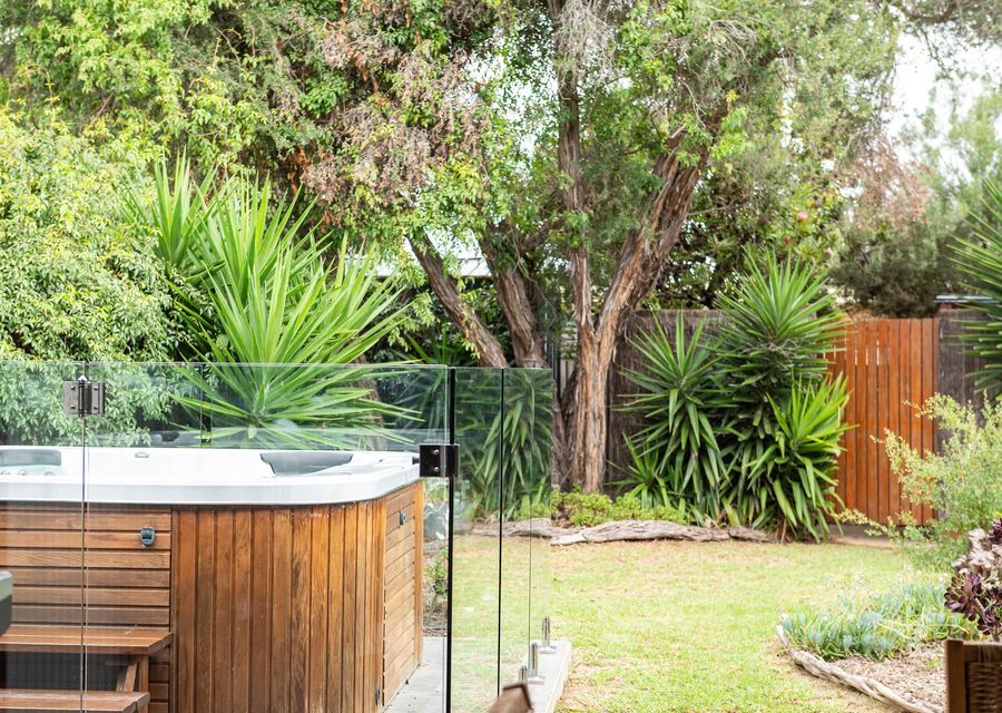 Enjoy the spa while the kids play in the secure yard 
