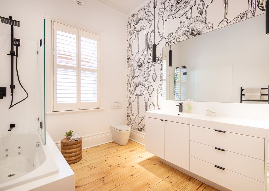 Family bathroom with shower over bath