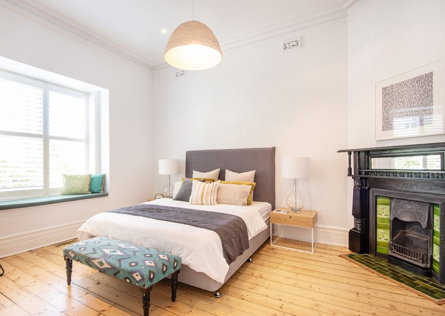 Bedroom 2 with King bed and decorative fire place