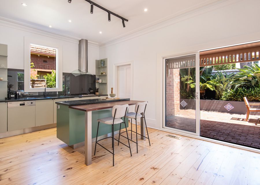 Chefs kitchen with breakfast bar