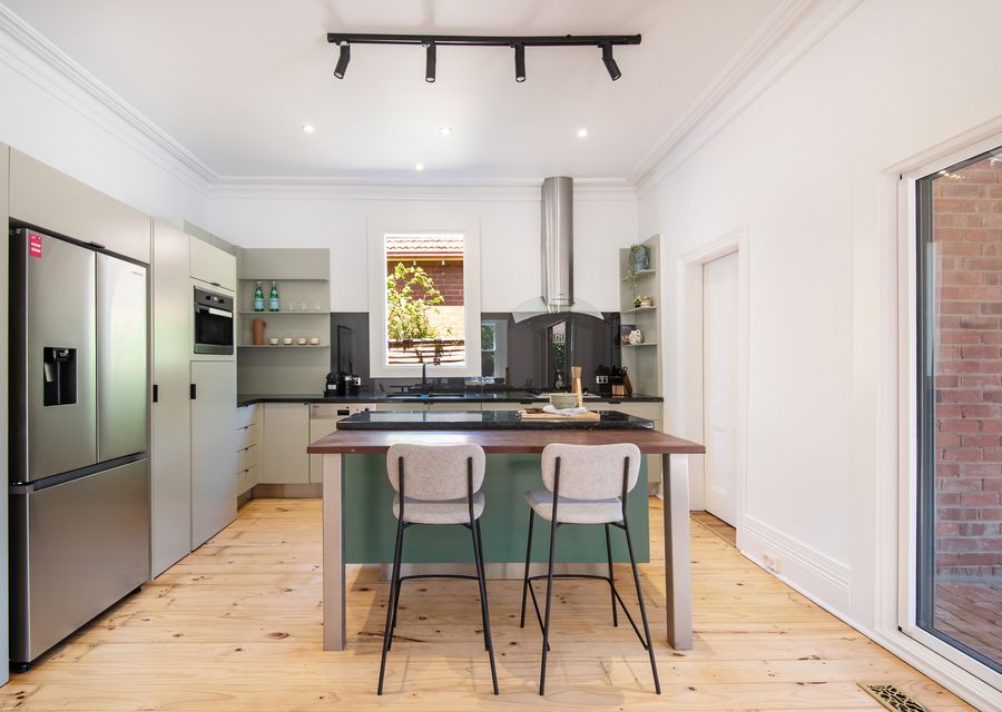 Chefs kitchen with breakfast bar