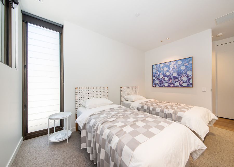 Bedroom with 2 long single beds