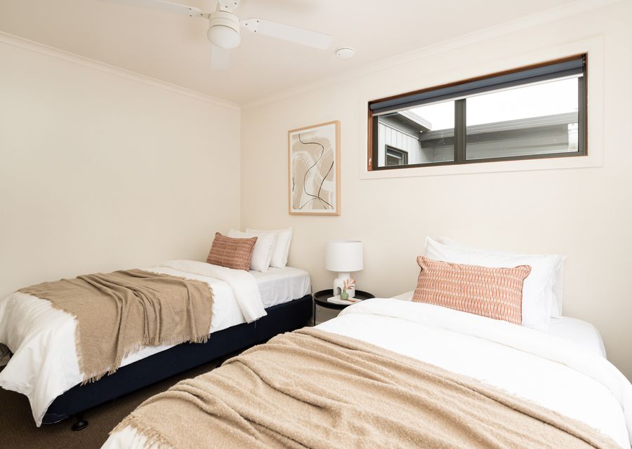 Second bedroom in front house with two single beds 