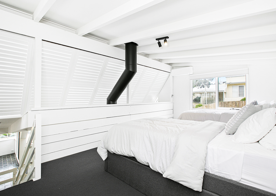 Bedroom four with 2 king single beds and two trundle beds 