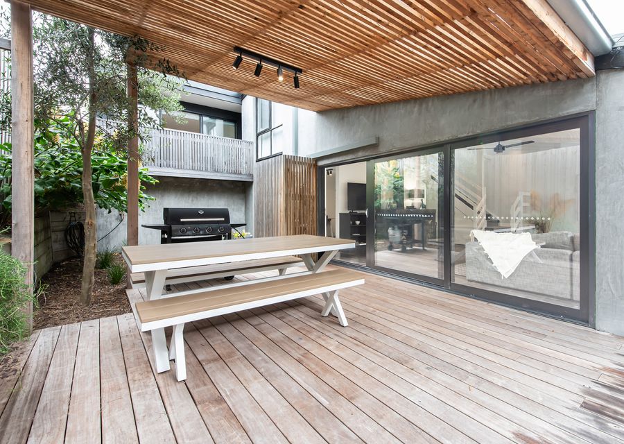 Our BBQ grill and alfresco dining area offer a picturesque setting for enjoying delicious meals in the fresh air.