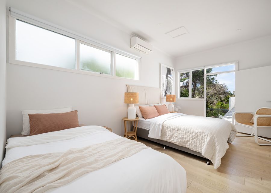 Bedroom Twelve with Queen bed and king single bed sleeping 3