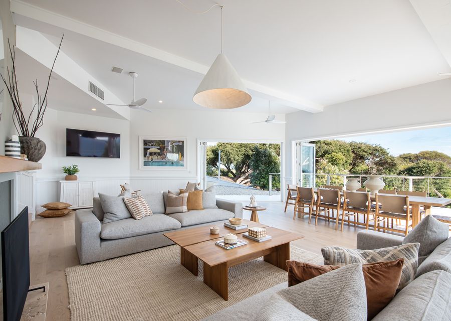 Main living with fireplace and air conditioning.  Doors open out onto balcony 