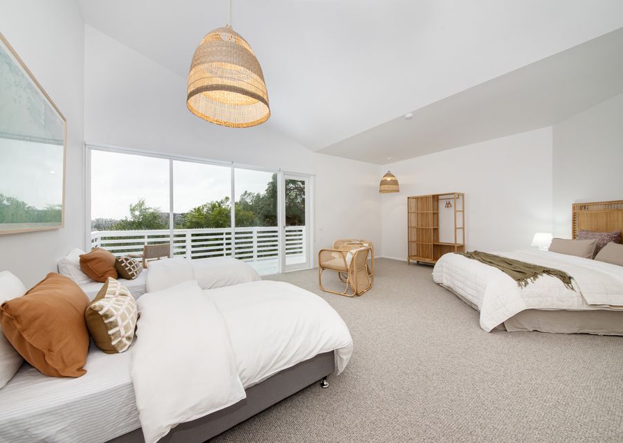 Bedroom six with king bed and two single beds 