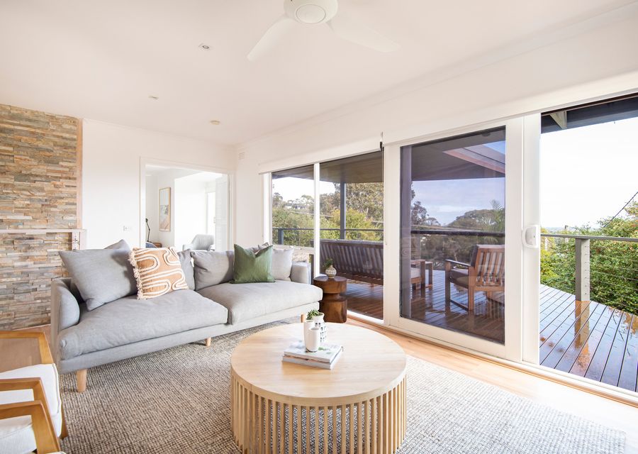 Upstairs living leading out to balcony 