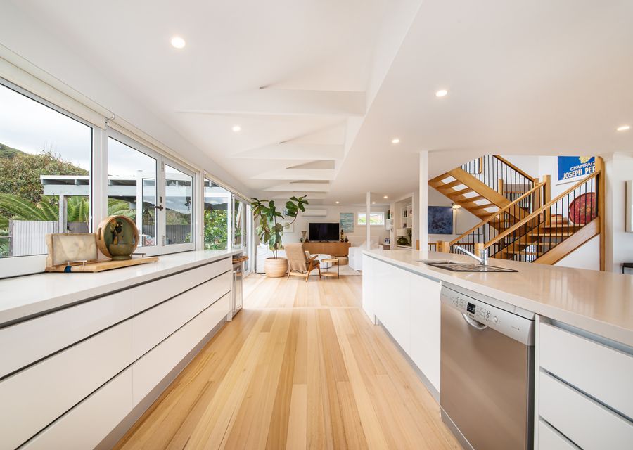 Light and bright fully equipped kitchen even with servery window for outdoor dining!