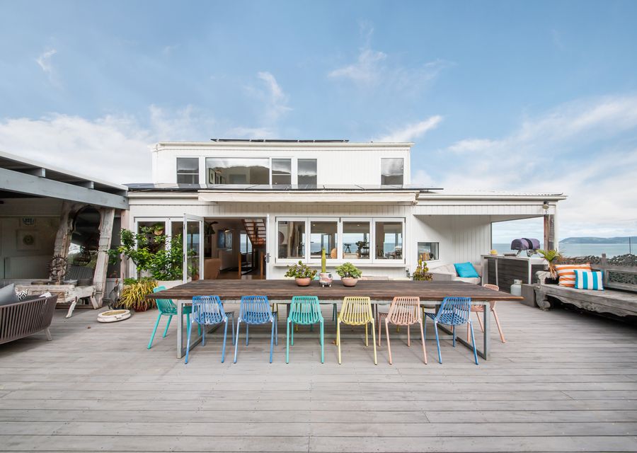 Back deck with plenty of space to relax, sit, enjoy the ocean sounds and hopefully sunshine!