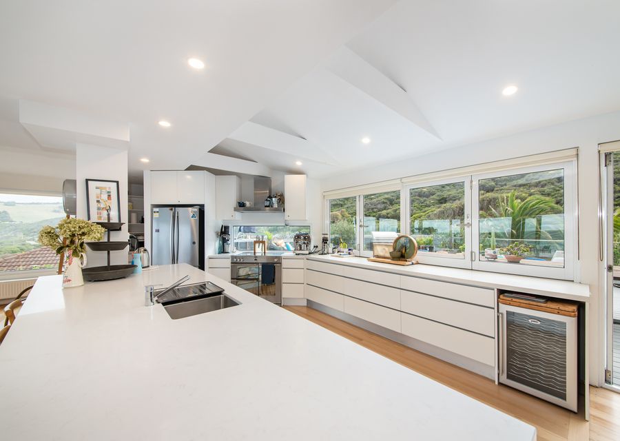Light and bright fully equipped kitchen even with servery window for outdoor dining!