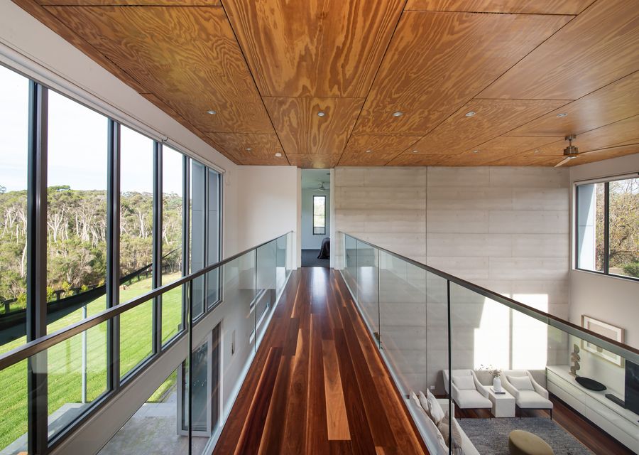 Impressive mezzanine walkway to master bedroom 