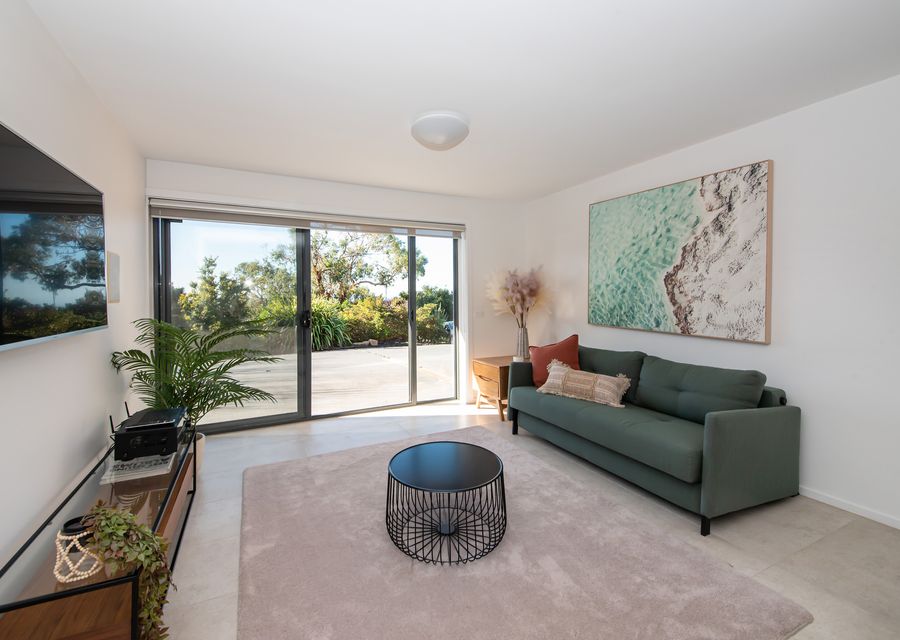 Welcome to our inviting downstairs living room.