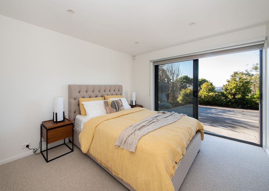 The bed serves as the centre of the room, inviting you to sink into its embrace and enjoy a restful night's sleep.