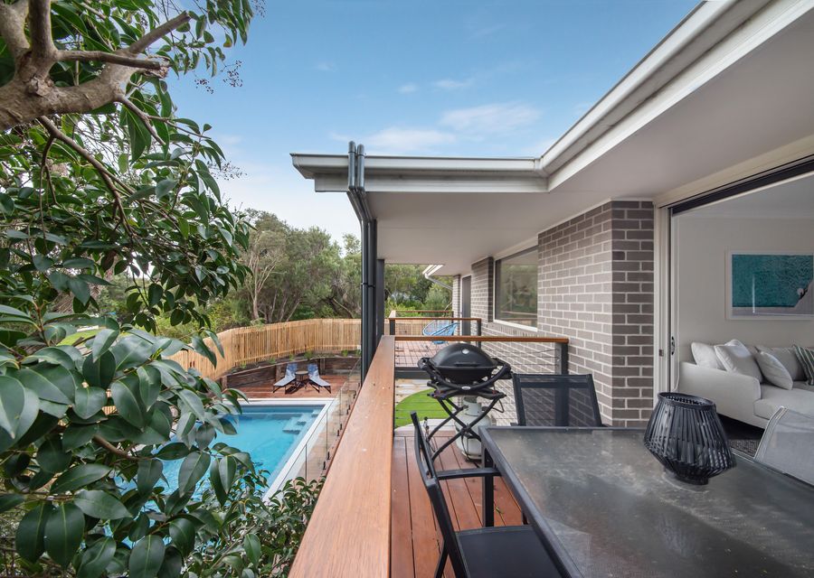 Upstairs balcony overlooking the pool and yard