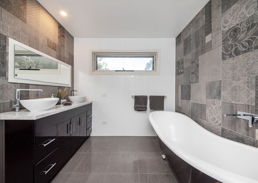 Main bathroom with bath and shower 