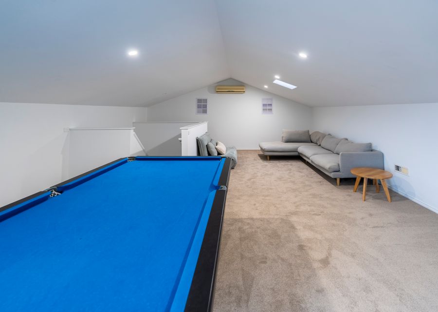 Third living area with pool table and games room