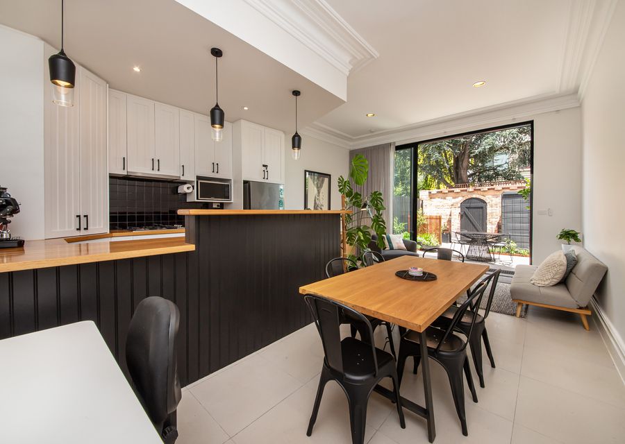 Open plan kitchen, dining and 2nd living space leading out onto the sunny courtyard