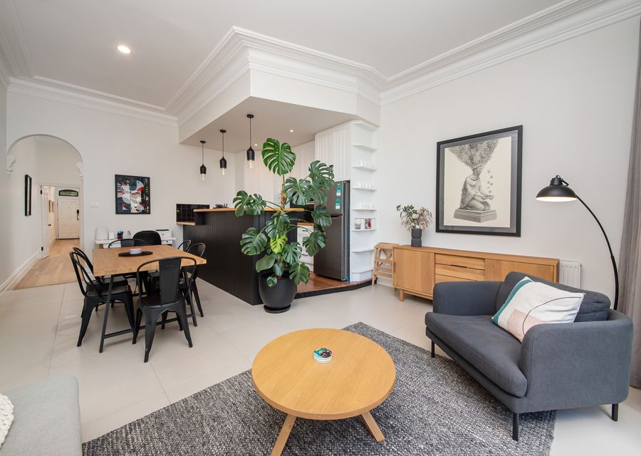Modern light and bright living space leading out to stunning courtyard 