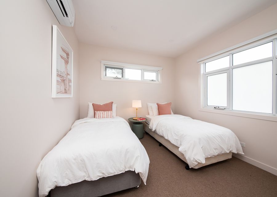 Welcome to our cozy bedroom three, featuring two comfortable single beds