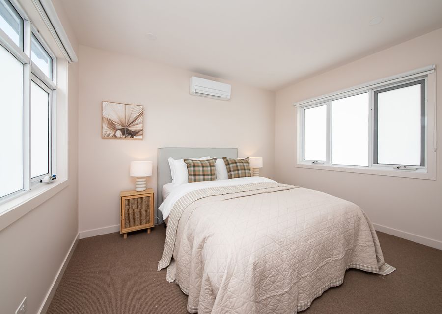 Welcome to our elegant bedroom two, featuring our sumptuous queen-sized bed