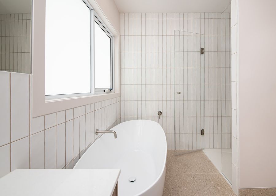 Enjoy our spacious tub, where warm water awaits you in soothing comfort.