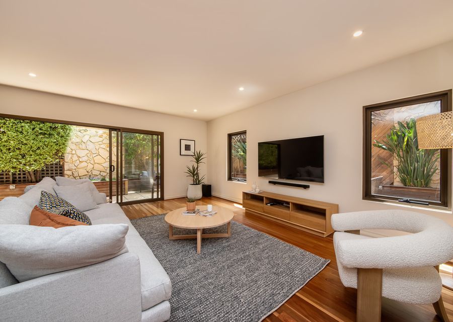Living area with smart tv and courtyard access 