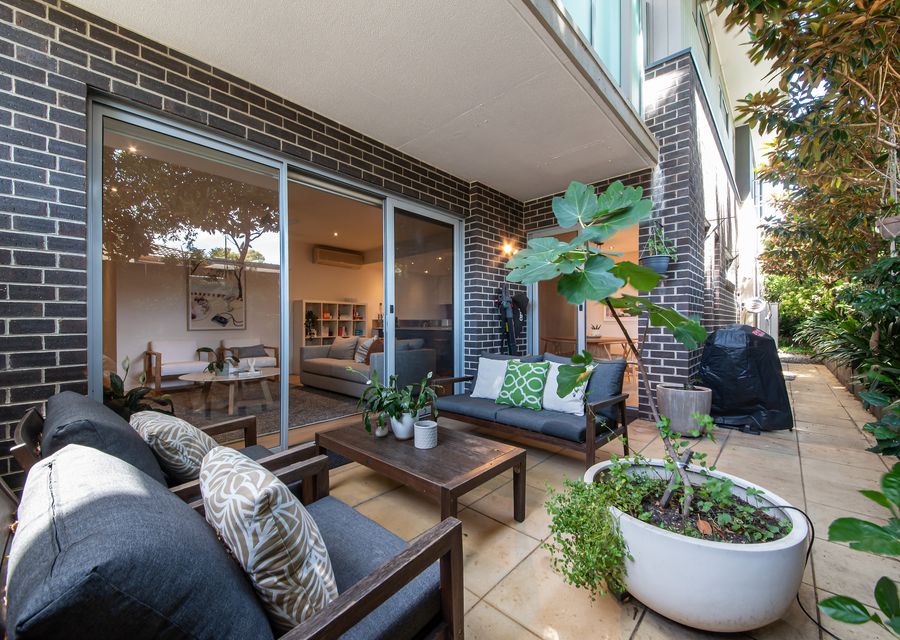 Secure courtyard  with bbq and outdoor seating 