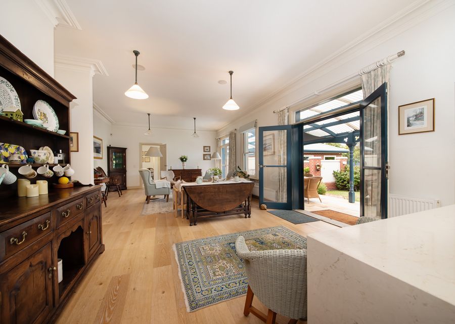 Lovely kitchen and living area with outdoor access to rear yard