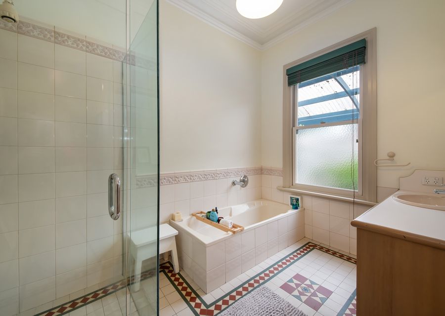 Main bathroom with small bath