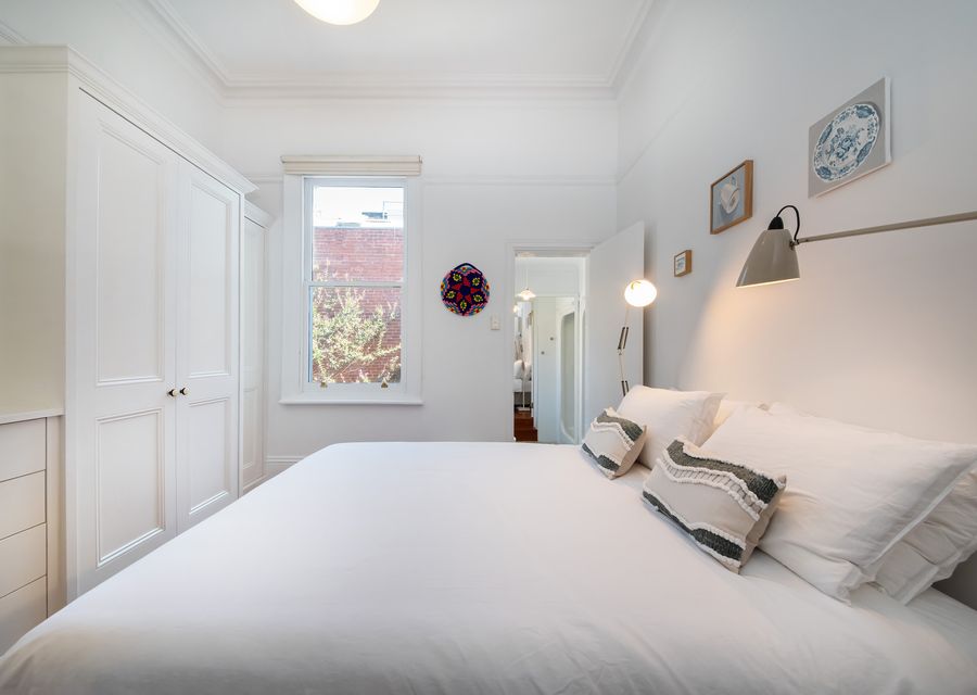 Master bedroom with queen bed and ensuite