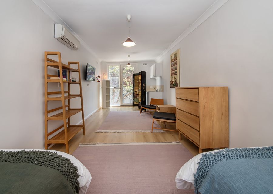 Studio bedroom above the garage