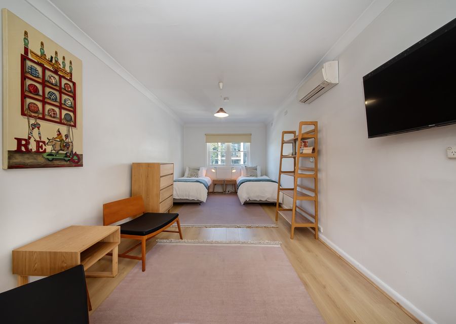 Studio apartment with 2 single beds and TV