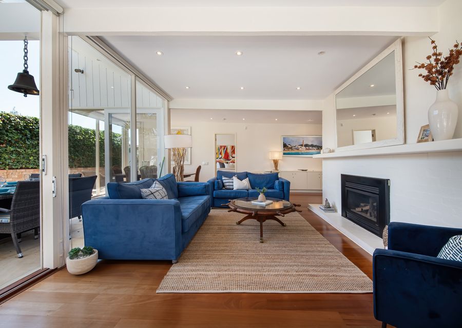 Living room area featuring the fireplace for extra-added cosiness