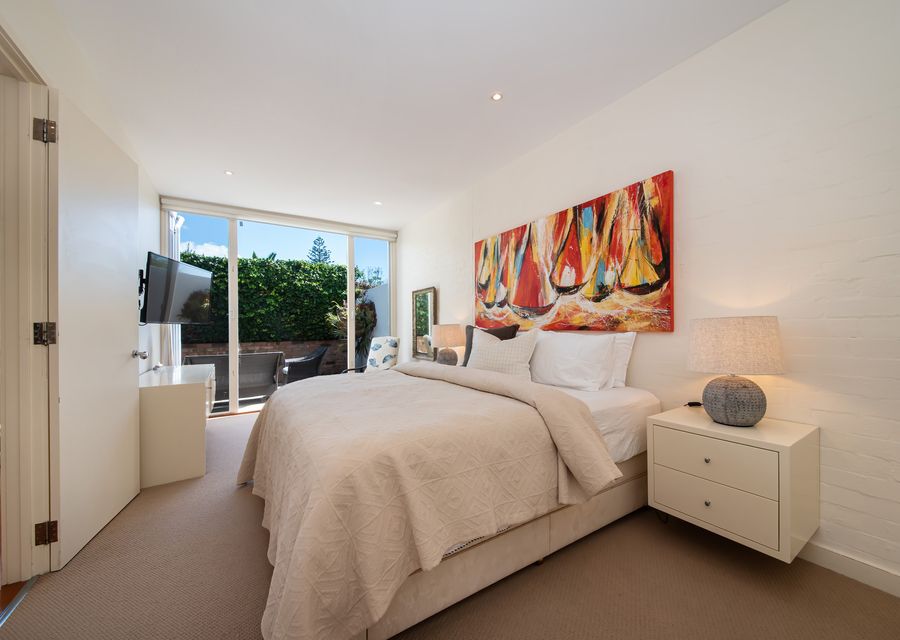 Master bedroom featuring a king-size bed