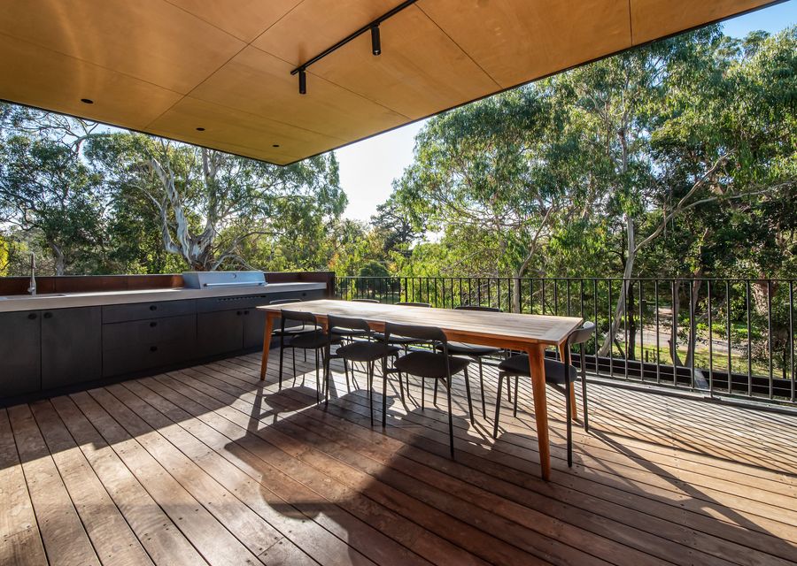 OUtdoor kitchen and dining area with views